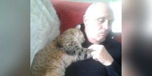 Man Recovering From Surgery Wakes Up To Find A Random Cat Cuddling Him